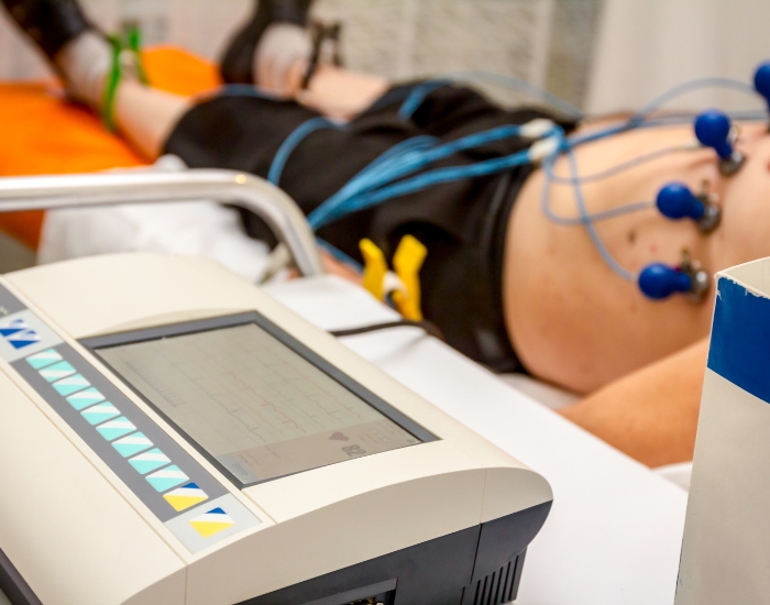Electrocardiogram tracing being reviewed