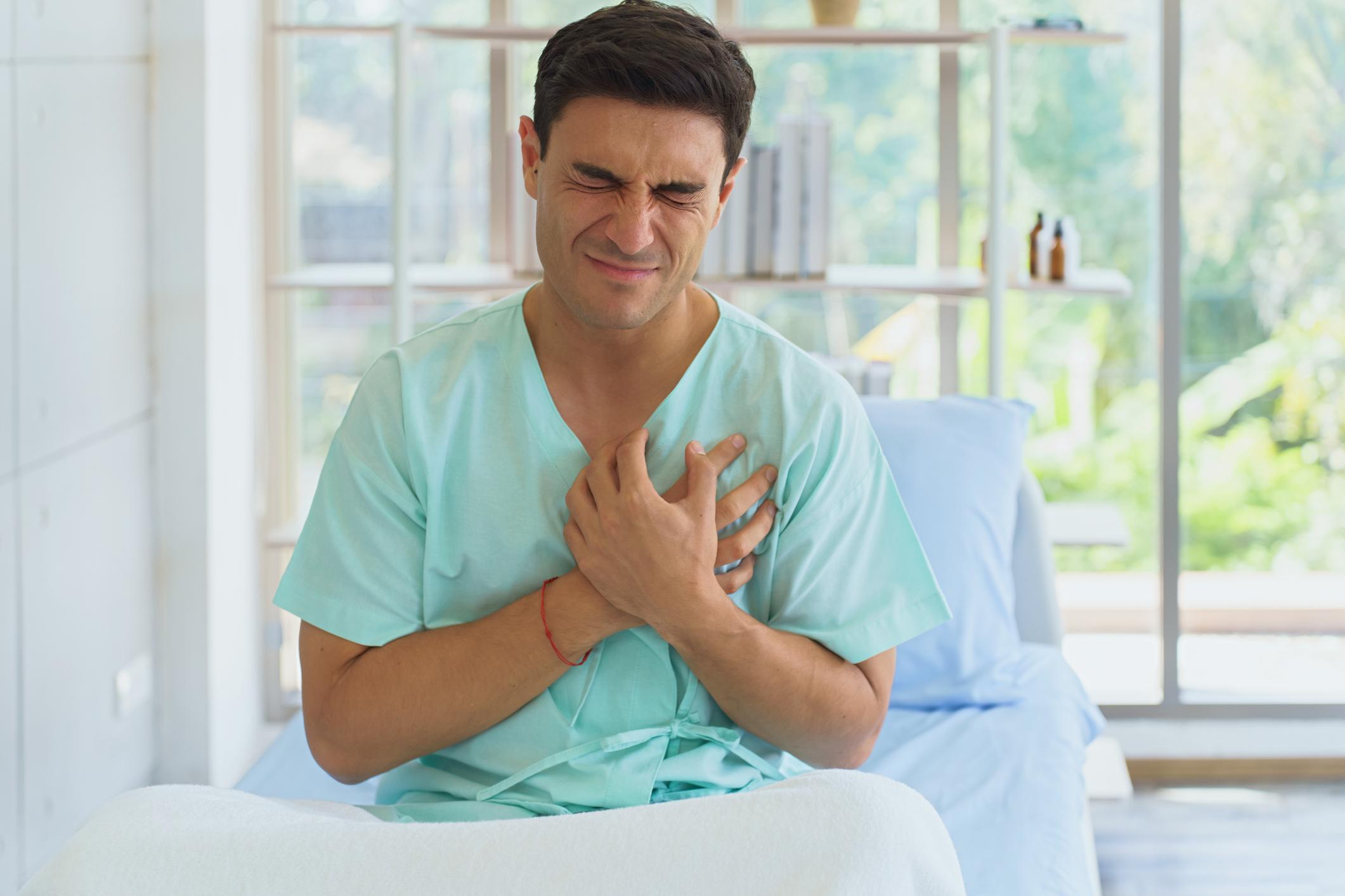 Chest pain heart warning symptoms during exertion indicating possible angina